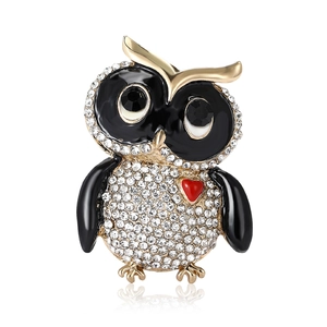 Sparkling owl brooch with rhinestones and red heart on a gold alloy base for women