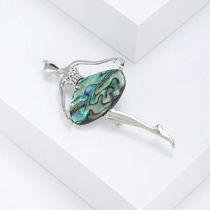 Elegant silver ballet dancer brooch with iridescent abalone shell and white rhinestones