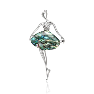 Macro shot of dancing ballerina brooch featuring iridescent abalone shell and crystals