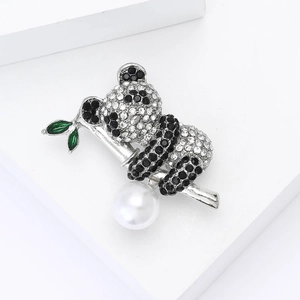 Sparkling panda brooch with rhinestones, green enamel leaves, and white pearl on silver base