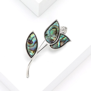 Elegant silver tulip brooch with iridescent shell petals and sparkling zircons