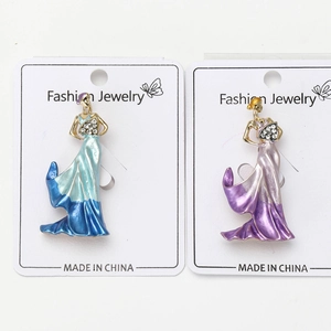 Detail of enamel folding fan lady brooches with rhinestones and gradient dress finish