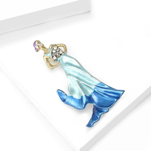 Detail of elegant dancing lady brooch with blue gradient enamel and shiny crystals