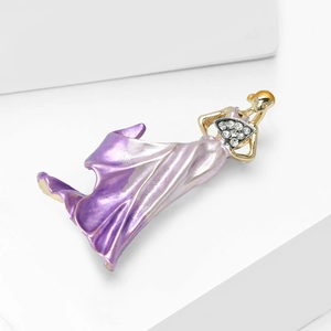 Detail of elegant female brooch with purple enamel gradient and fan-shaped rhinestones