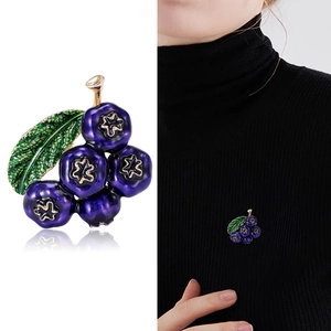 Cute blueberry enamel brooch pin for women with blue fruit beads and green leaves on black sweater