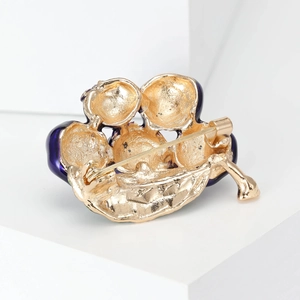 Back view of cute blueberry brooch with gold-plated alloy and secure rotating safety clasp