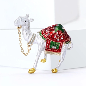 Elegant silver camel brooch with red green enamel inlay and sparkling rhinestones