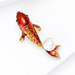 Artistic koi fish brooch with red enamel gradient and a large white pearl accent