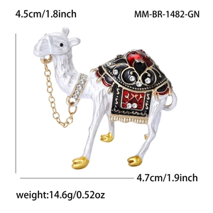 Elegant camel enamel brooch with sparkling rhinestones and golden accents in pearl white