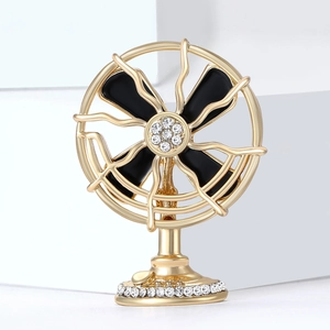 Creative vintage electric fan brooch with gold frame, black enamel, and sparkling crystals