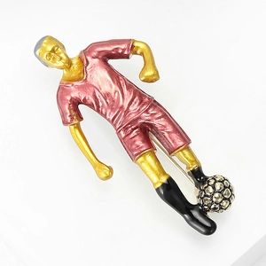 Detail of soccer player brooch showing enamel finish and alloy pin fastener back