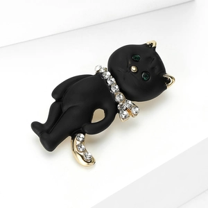 Eleganter schwarzer Katzen-Anstecker mit grünen Kristallaugen und vergoldeten Akzenten