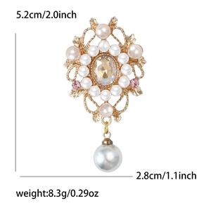 Broche fleur vintage en alliage doré avec strass et pendentif perle mesurant 5,2 cm par 2,8 cm