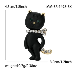 Schicker schwarzer Katzenbrosche mit grünen Kristallaugen und Strasshalsband für Blazer