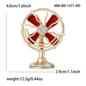 Vintage gold-plated electric fan brooch with red enamel blades and sparkling rhinestones