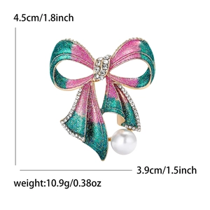 Dimensions broche nœud: 4,5 cm de haut, 3,9 cm de large, avec paillettes et perle