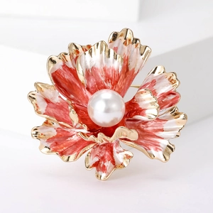Detail of peony brooch with red gradient enamel petals, gold edges and a white pearl