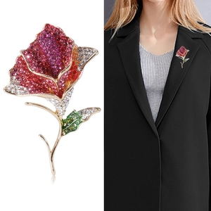 Sparkling crystal rose brooch with gradient rhinestones on elegant black suit lapel
