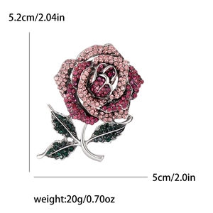 Elegant rose flower brooch pin with sparkling pink rhinestones and green leaf details