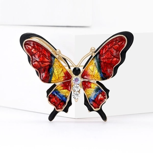 Exquisite butterfly brooch with colorful enamel wings and sparkling rhinestones