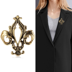 Vintage gold fleur-de-lis brooch pin with antique finish for elegant clothing styling