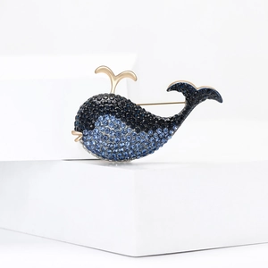 Broche baleine en strass bleus et finition dorée pour accessoire de manteau pour femme