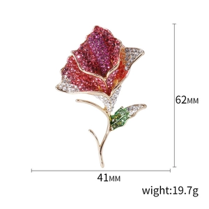 Sparkling rose brooch with multi-color rhinestones and dimensions 62mm by 41mm