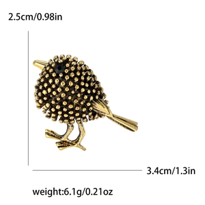 Broche oiseau vintage en alliage doré avec dimensions 3,4cm x 2,5cm et poids 6,1g