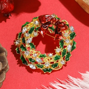 Weihnachtskranz Brosche mit grünen Emaille-Blättern, roter Schleife und glänzenden Strass