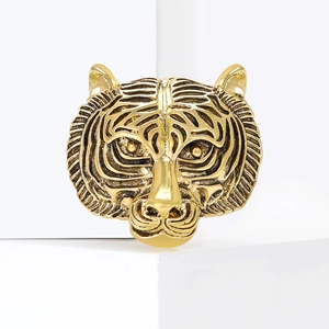 Vintage gold tiger head brooch with detailed 3D relief carving for fashion accessory