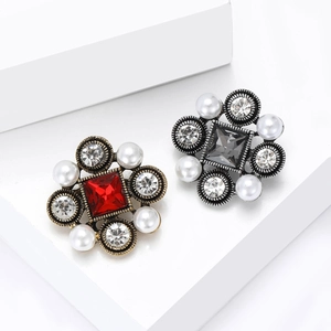 Vintage Baroque pearl brooches with ruby and dark crystal stones in gold and silver finish