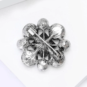 Vintage Baroque floral brooch in antique silver finish with secure safety pin clasp back