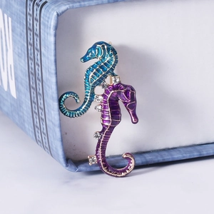 Charming seahorse brooches in blue and purple enamel with sparkling rhinestones decoration