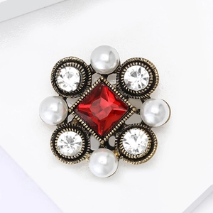 Baroque vintage brooch with red square rhinestone and white pearls on aged gold base