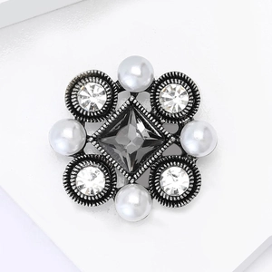 Vintage Baroque brooch with grey crystal and white pearls on blackened metal frame