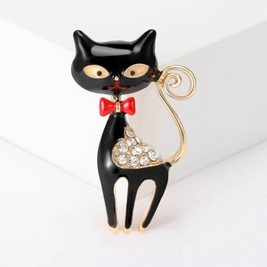 Schicke schwarze Emaille Katzenbrosche mit roter Schleife und funkelnden Strasssteinen