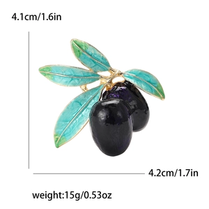 Detailed view of enamel olive branch brooch with 4.1cm by 4.2cm dimension markings