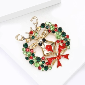 Broche exquise de renne et couronne de Noël dorée avec strass et nœud rouge