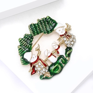 Broche couronne de Noël exquise avec bonhommes de neige et strass sur socle blanc