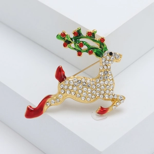 Broche de renne de Noël dorée avec des strass étincelants et des détails en émail coloré