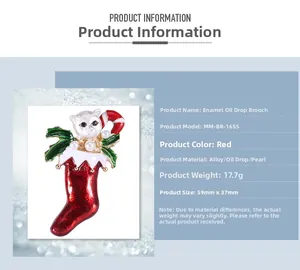 Detail view of enamel Christmas cat in stocking brooch with holly and pearl accents