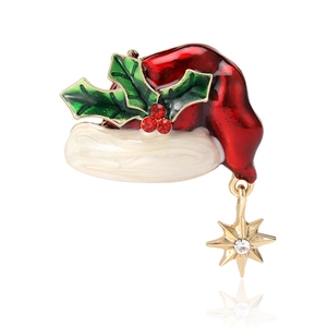 Enamel Christmas hat brooch with holly leaves and gold star pendant in 1688 fashion style