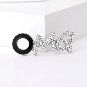 Vintage OMG letter brooch with silver alloy base, black enamel and sparkling rhinestones