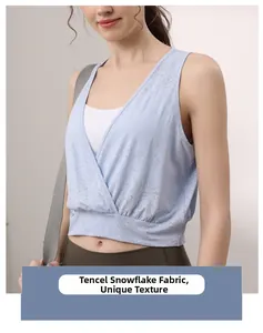 Close-up of sky blue jacquard yoga vest showing unique Tencel snowflake fabric texture