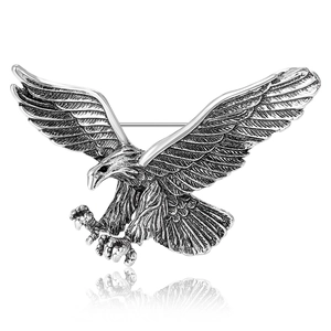 Vintage silver eagle brooch in a powerful diving pose for men's suits and coats
