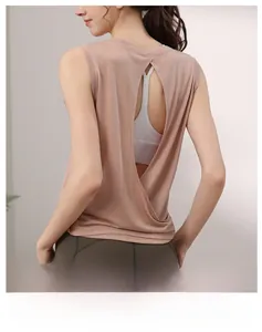Open back yoga tank top for women featuring a rose pink breathable loose fit design
