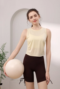 Detail view of Tencel yoga tank top with drawstring side shorts and mesh texture