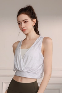 Close-up of jacquard yoga vest showing V-neck design and breathable fabric texture