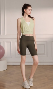Women's jacquard yoga vest and olive high-waist cycling shorts with side pocket details