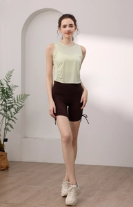 Detail view of Tencel sports tank top with side pleated design and adjustable drawstring hem